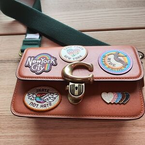 Coach Studio 19 handbag with patches Pride edition